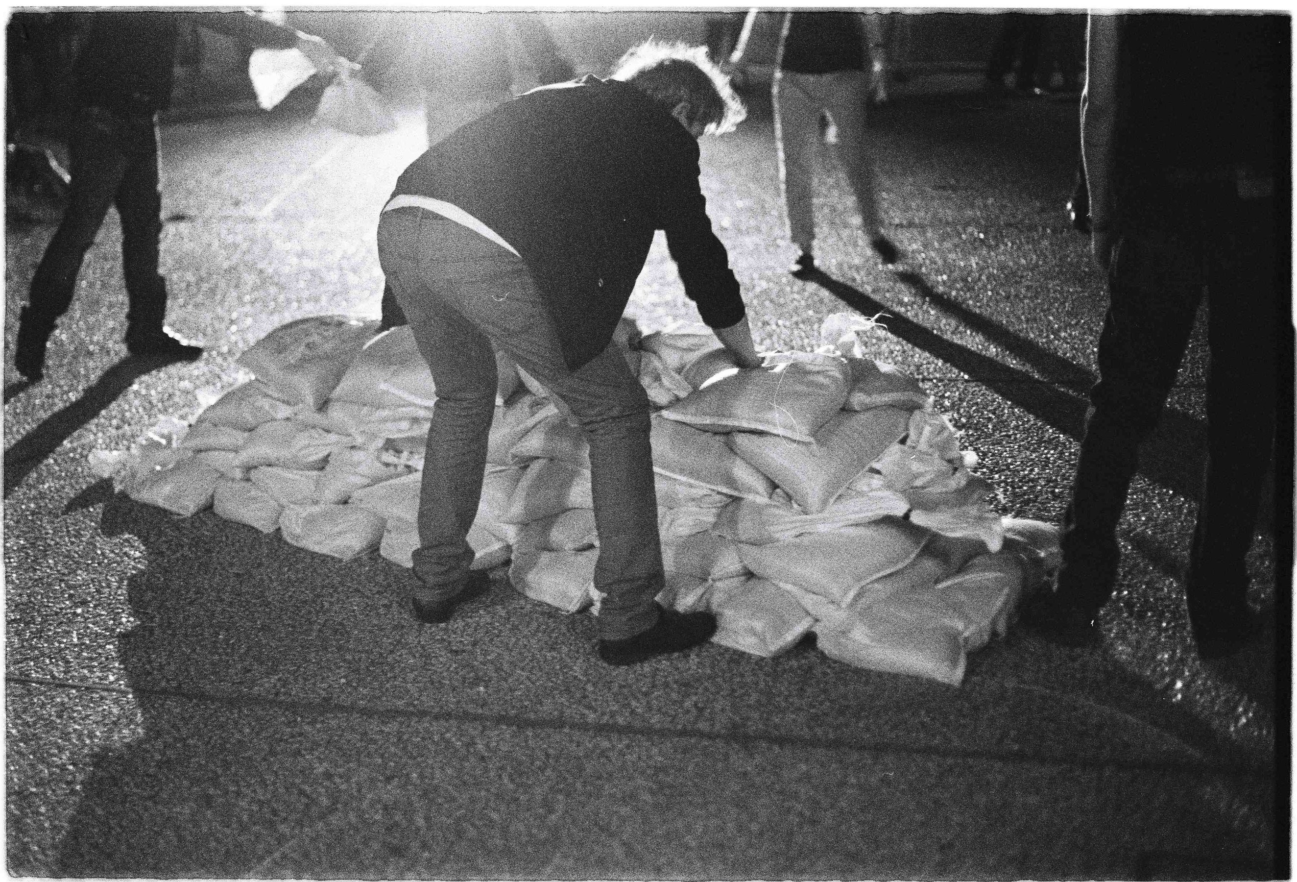 Action for a sandbag brigade - writing the borders of crisis, 2011 performance